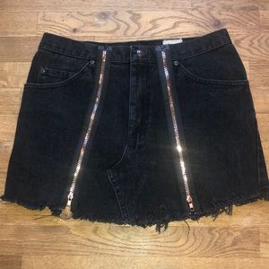 Black denim mini skirt with rose gold zippers